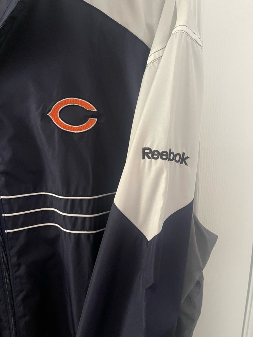 Reebok Navy, White and Orange Colorblock Windbreaker Jacket Sports Illustrated